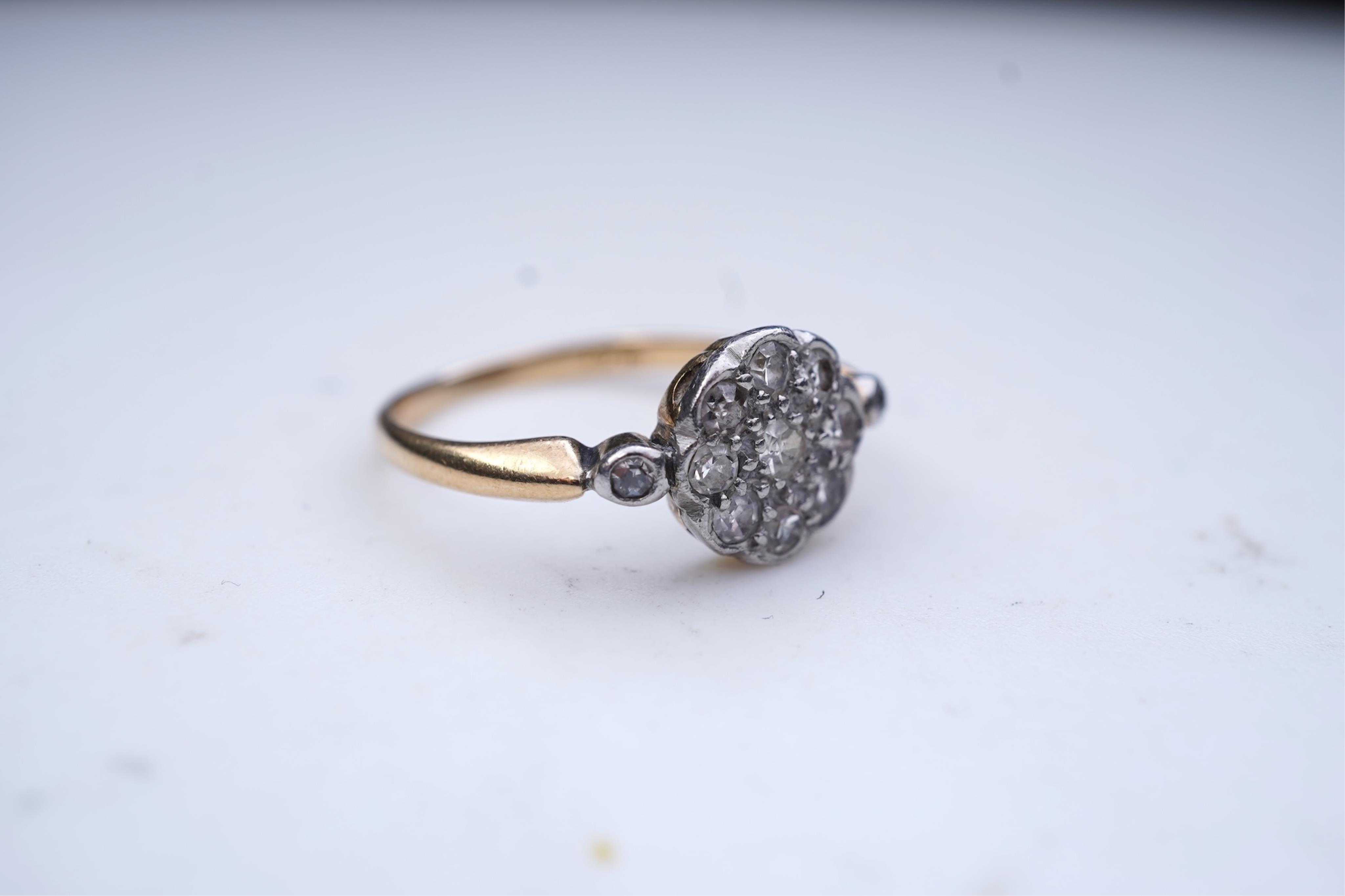 A diamond cluster ring, early 20th century